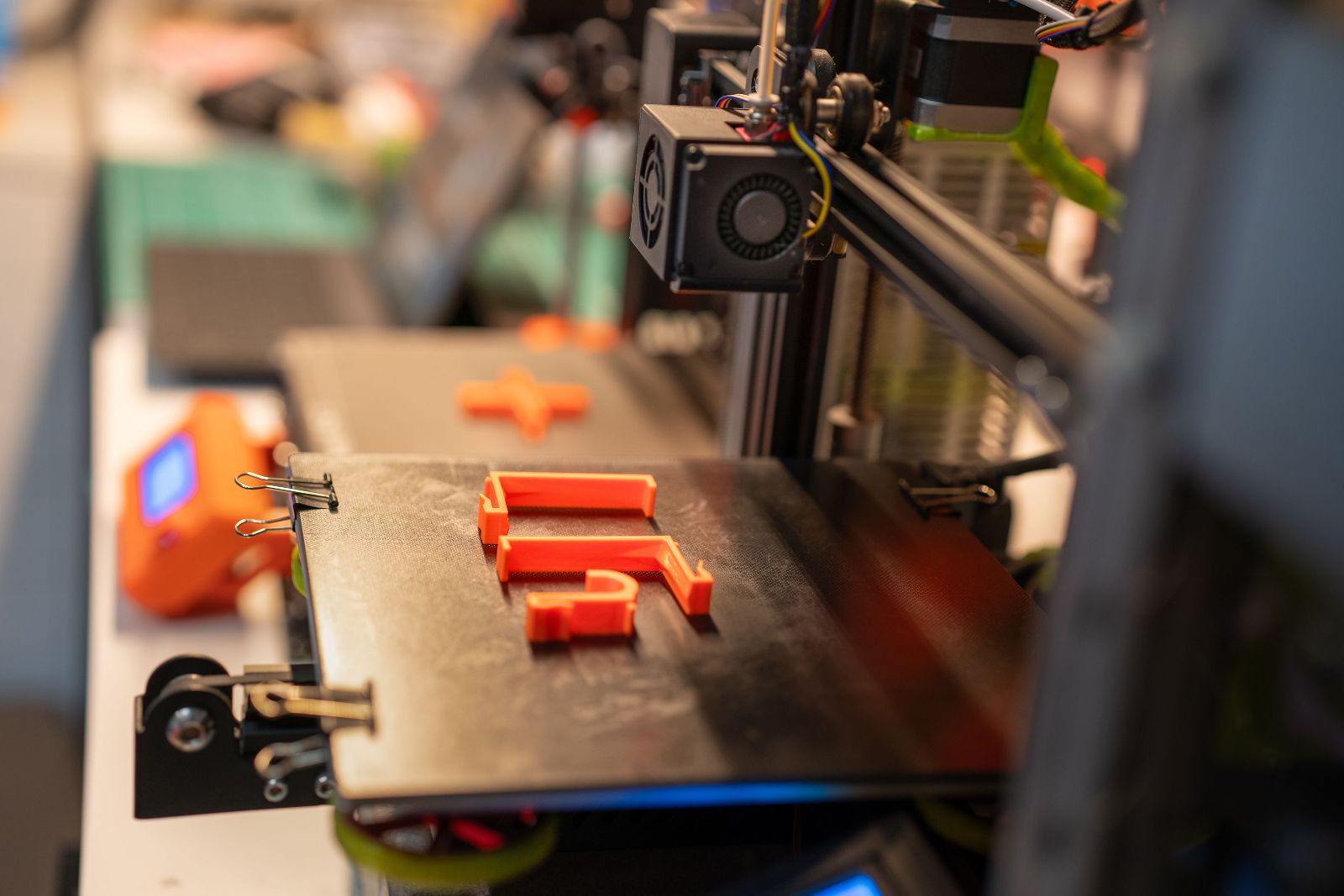 Freshly printed parts on a 3D printer bed